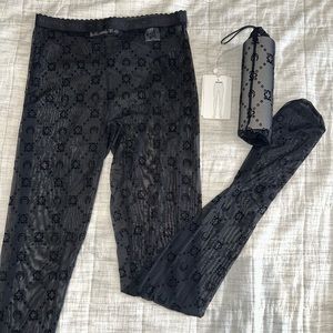 Marine Serre
flocked-pattern sheer tights